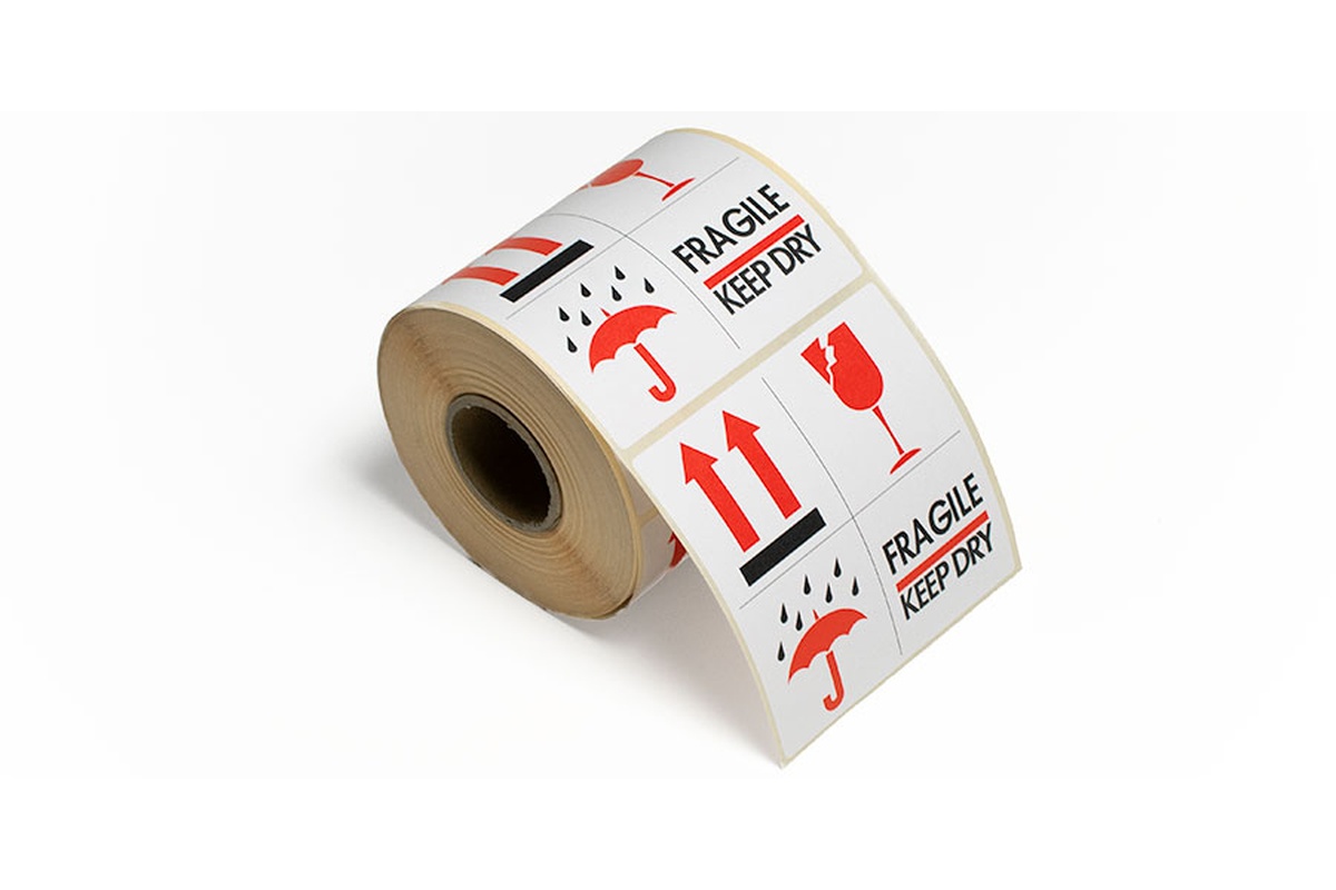 Etikettendispenser klein voor 1 rol met etikketen "Fragile / Keep dry"