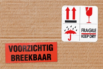 Welk waarschuwingsetiket moet ik kiezen voor een veilige verzending
